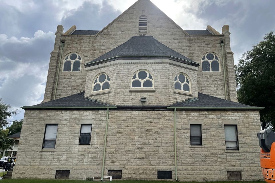 The same church wall after a soft wash